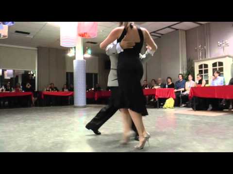  Stefania Colina  and  Juan Martin Carrara  are  dancing  to  "  Vuelve amor  "  by  Fulvio Salamanca