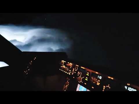 Thunderstorm over Kearney NE viewed from cockpit of Boeing 747 at 41,000 feet