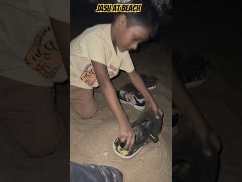 Jasu playing at beach