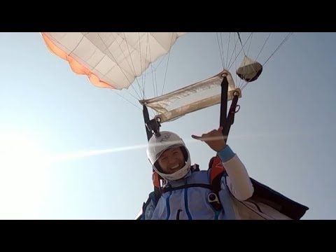 Combined super stunt: first paraglider, then wingsuit