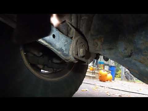 Installing pro form fabrication control arms on a Dodge Ram.