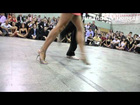  Sebastian Missé  and  Andrea Reyero  are  dancing  to  a  tango