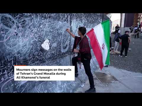 Video Thumbnail: Mourners sign messages on walls during Khamenei funeral