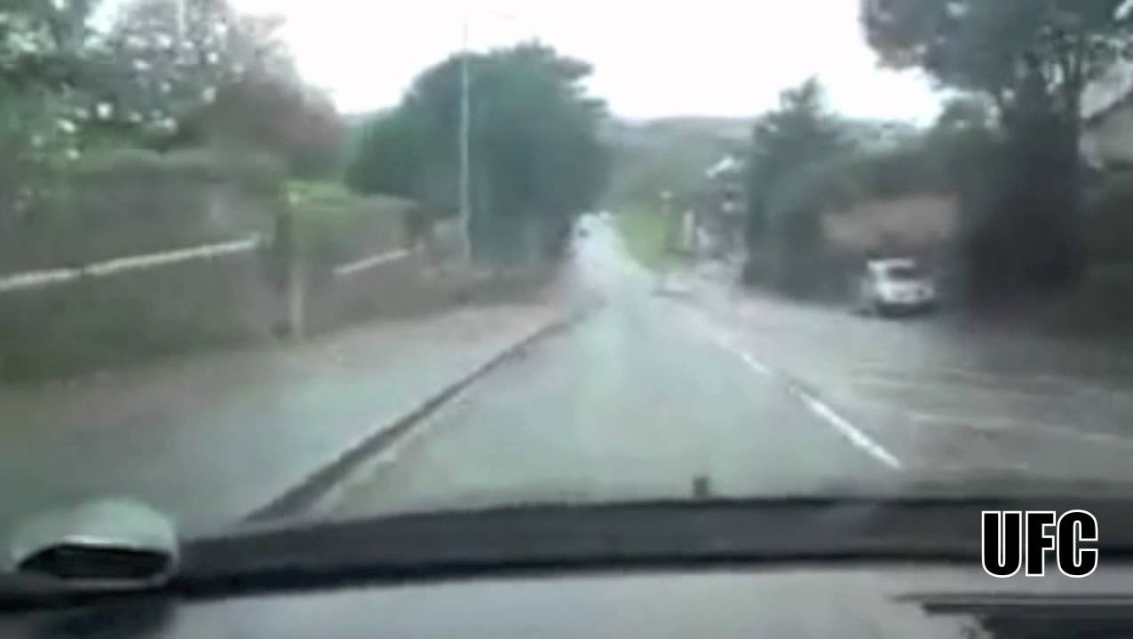 Man splashes kids at bus stop