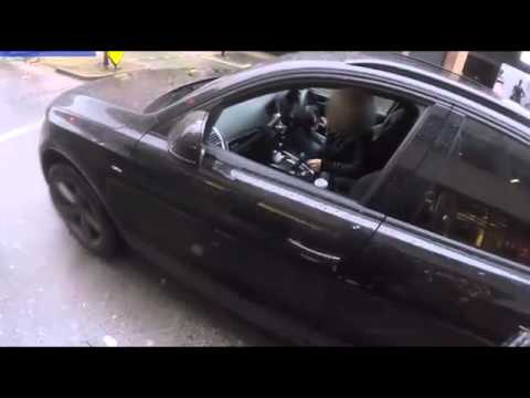 Motorist caught using a laptop while behind the wheel