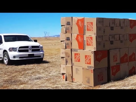 Speeding into a GIANT Box Fort with a Truck!! Video