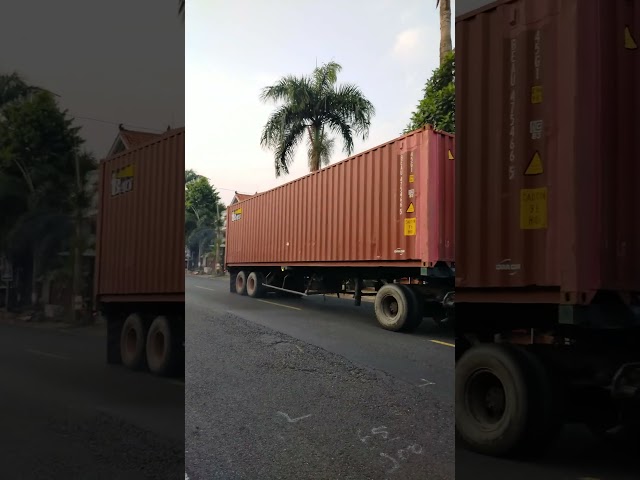 Huge Red 40ft Container Truck Passing in Jepara