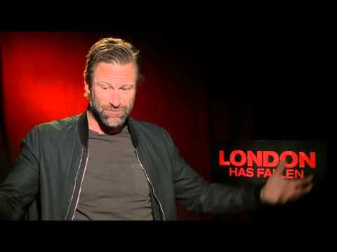 London Has Fallen: Aaron Eckhart Official Movie Interview | ScreenSlam