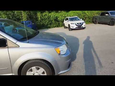 2013 Dodge Grand Caravan 4dr Wgn SXT in Silver for sale at Finch Chrysler Dodge Jeep Ram Ltd in London, ON