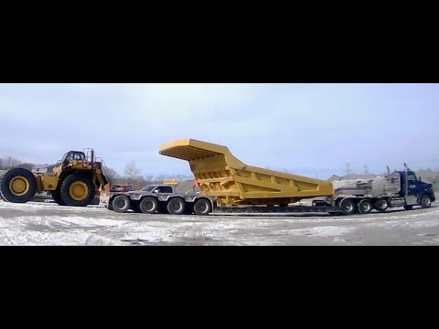 Rock truck video l Oversize load l 🚚Dump box l Super load l Caterpillar l Traffic signs moved, no