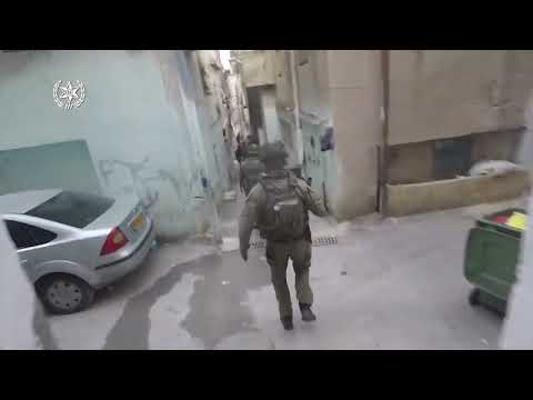 Uniformed and undercover Yamas counter-terrorist operators in the Shu'afat refugee camp