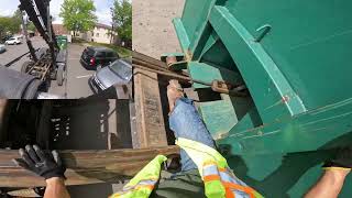Switching Dumpsters at a Complex, Roll Off Work Peterbilt Truck
