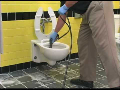 Cleaning a toilet with no touch cleaning system