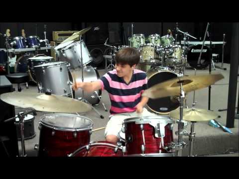 13 yr old kid rocks out on drums @ East Coast Drums