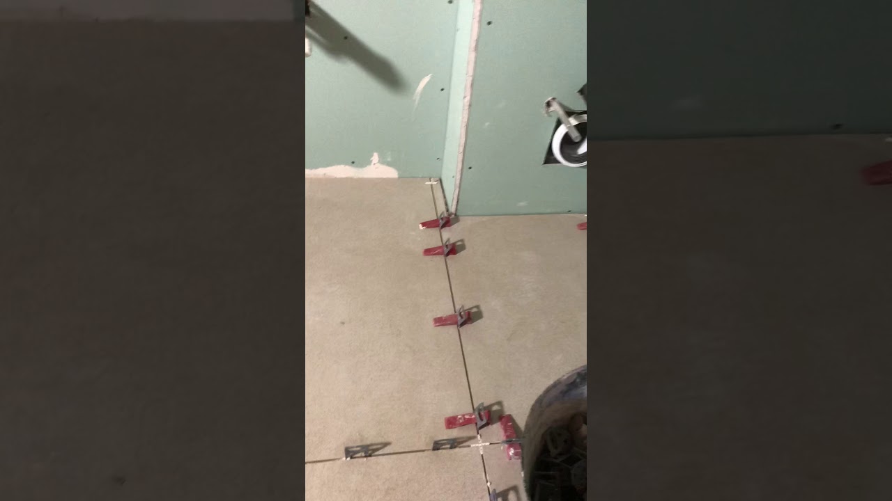 How to tile floor for wet room