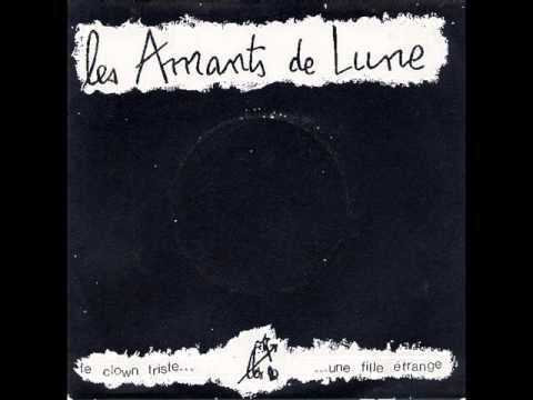 Les Amants De Lune - Le Clown Triste-Une Fille Etrange 7'' (1986).wmv