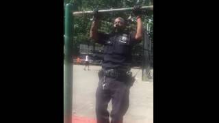 Police Officer Participates In Pull-up Park Jam In Uniform
