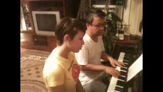 Karina Pasian rehearsing a new song in Russian with her coach Boris Buriev