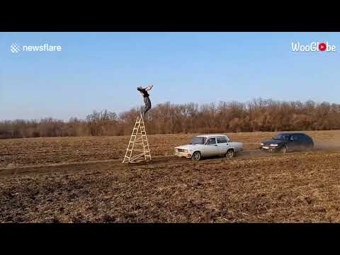 shorts +Russian daredevil flips over moving cars in incredibly dangerous stunt