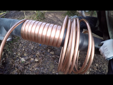 Off grid round house build part 35 hot water coil for the wood stove