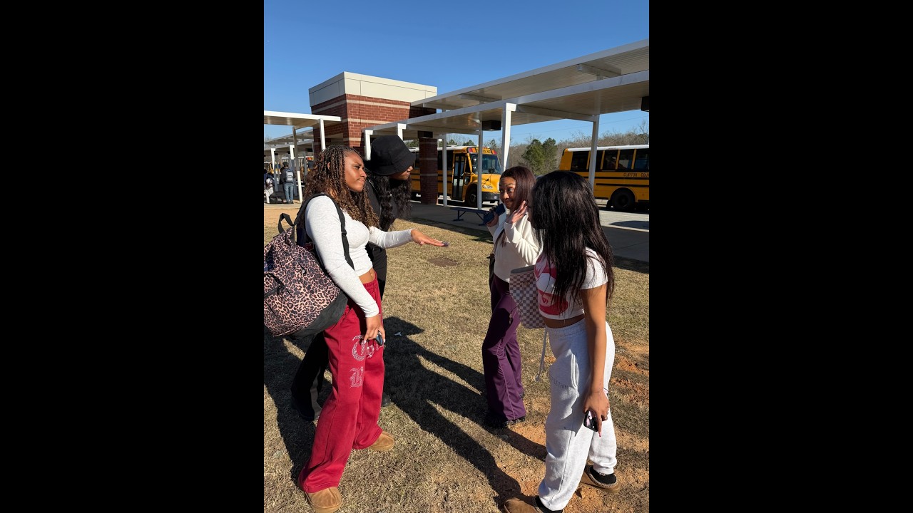 Destiny & the Bday Girl ready to throw hands with Hope & Faith at the bus ramp when the AP walks up!