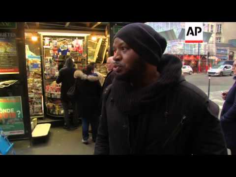 Long lines form at news outlets as Charlie Hebdo goes on sale across France
