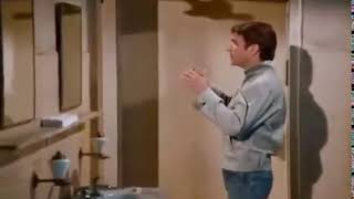 The Fonz doing his hair