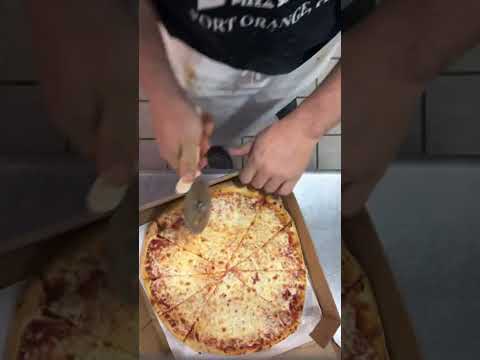 Pizza cut in 12 for the school kids making it look easy all day ￼