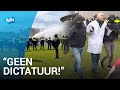 Duizend coronademonstranten  ingesloten en afgevoerd door politie