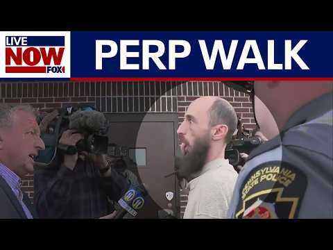 Video | Cody Balmer: Man accused of setting fire to Shapiro home arrives at court, sticks tongue out