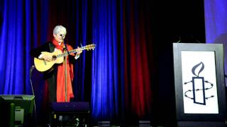 Joan Baez sings God is God by Steve Earle sy Amnesty International IN San Francisco