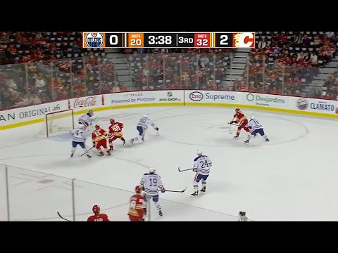 MacKenzie Weegar scores his first as a Flame