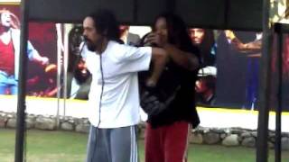 Damian Marley putting hair in backpack to play Soccer (GENIUS!)