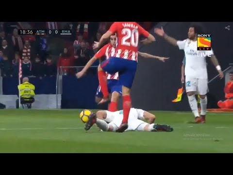 Angel Correa purposely kicks the ball onto Benzema's  head while he was laying on the ground