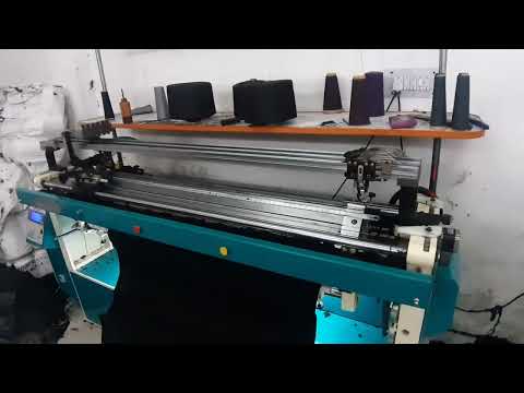Semi-computerized single jersey flat knitting machine