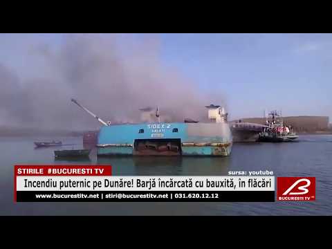Incendiu puternic pe Dunăre! Barjă încărcată cu bauxită, în flăcări