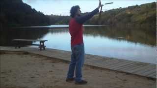 Advanced nunchaku: In spin thumb roll