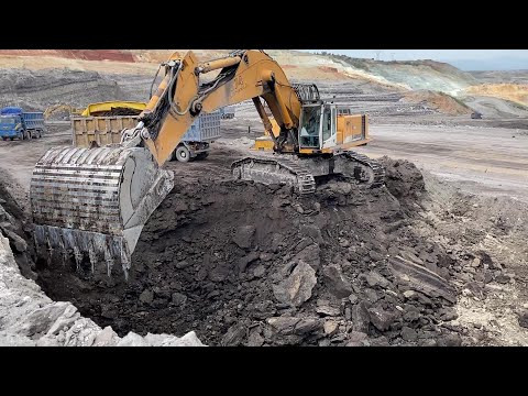 Liebherr 974 Excavator Loading Mercedes And MAN Trucks