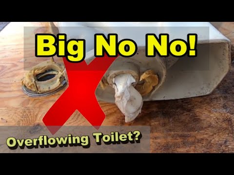 image-How to unclog overflowing toilet?