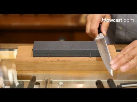 Part of a video titled How to Use a Sharpening Stone | Knives - YouTube