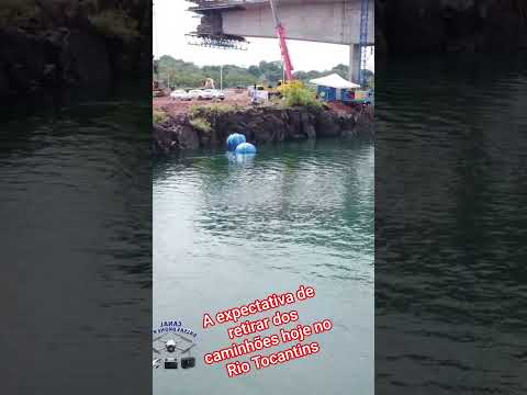 a expectativa de retirada dos caminhões hoje no Rio Tocantins