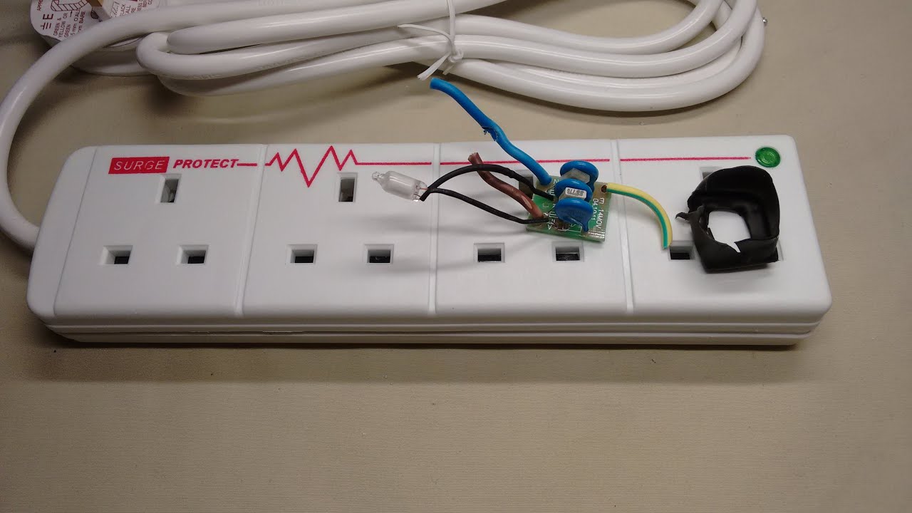 Inside a Hyundai surge protection strip.  (With schematic.)
