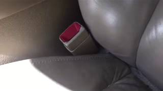 Replacing the seatbelt latch. Suburban, Yukon, Tahoe, GMC, Chevrolet