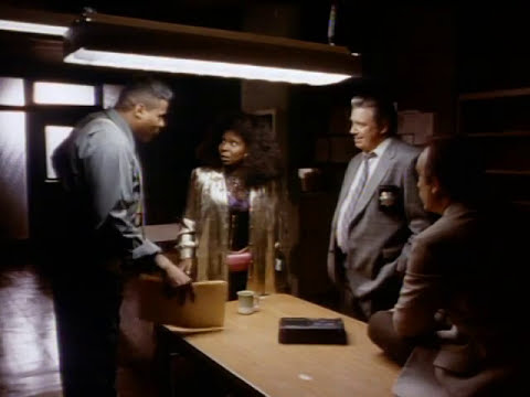 Trailer moment: Deloris conducts in sunglasses as the choir hits the modulation