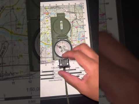 Orient a map using lensatic compass