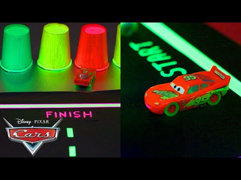 What Makes a Racetrack Glow in the Dark? | Science of Glowing | Pixar Cars