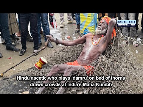 Hindu ascetic who plays ‘damru’ on bed of thorns draws crowds at India’s Maha Kumbh