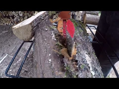 #206 BRAVE Dual Split wood splitter. Splitting and stacking firewood on a rainy day. outdoor channel