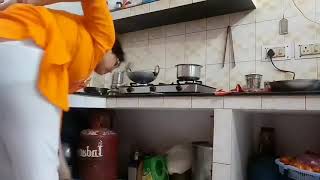 Indian aunty Cleaning kitchen