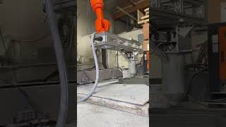 RIC tech printing concrete on a kuka robotic arm